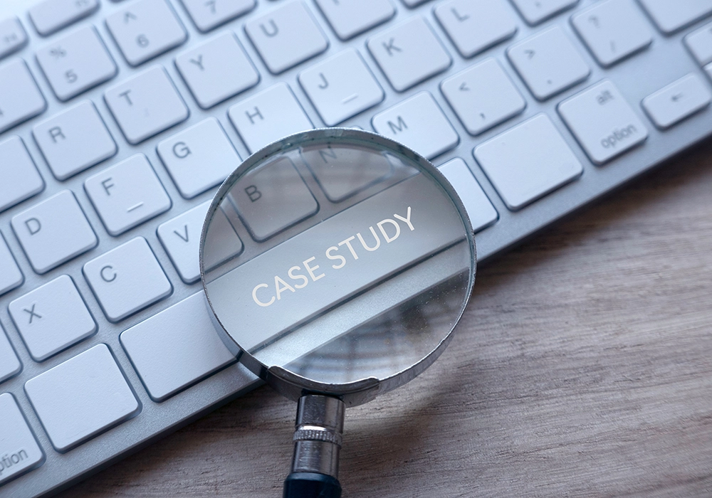 A magnifying glass with the word "case study" on it, showcasing social proof.