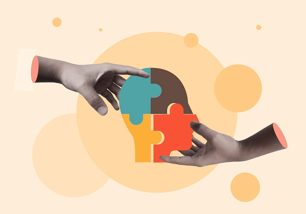 Two hands reaching for a puzzle piece, showcasing the inherent human tendency towards social proof.