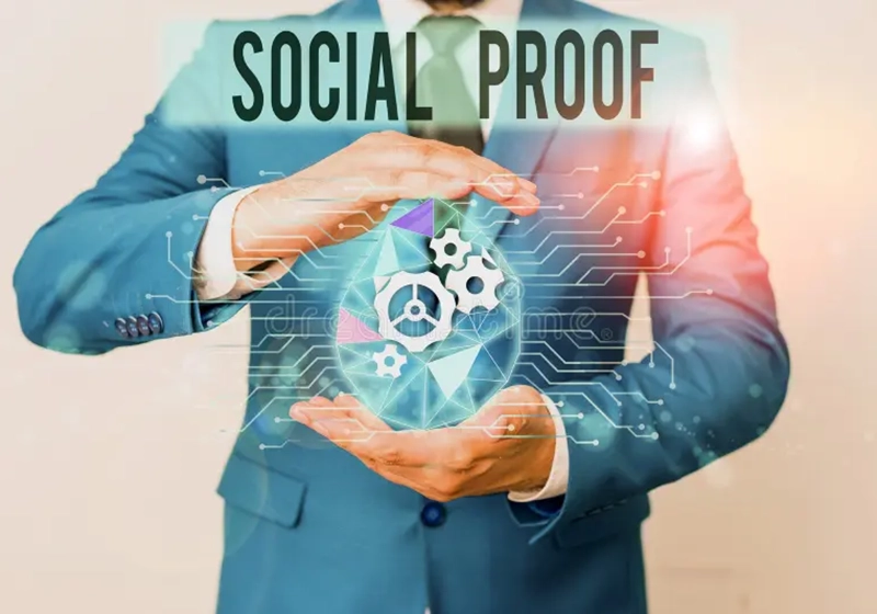 A man in a suit holding a social proof sphere, demonstrating the influence of social proof bias.