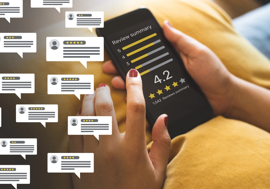 A person holding a phone showcasing numerous customer reviews, illustrating social proof bias.