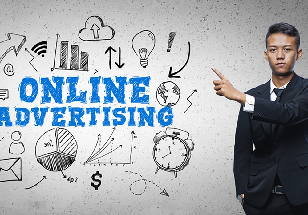 A businessman pointing to the word online advertising while discussing traditional advertising strategies.