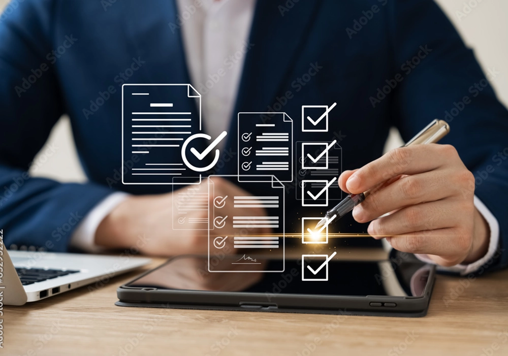 A businessman using a tablet computer to monitor application performance.