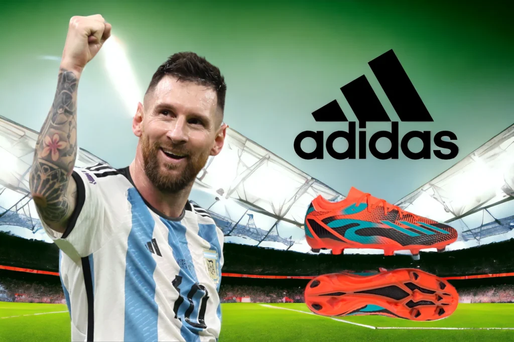 Lionel Messi, a celebrity in the soccer world, wears an Argentina jersey featuring a prominent Adidas logo, celebrating on the field with his signature Adidas soccer cleats showcased against a stadium backdrop, highlighting